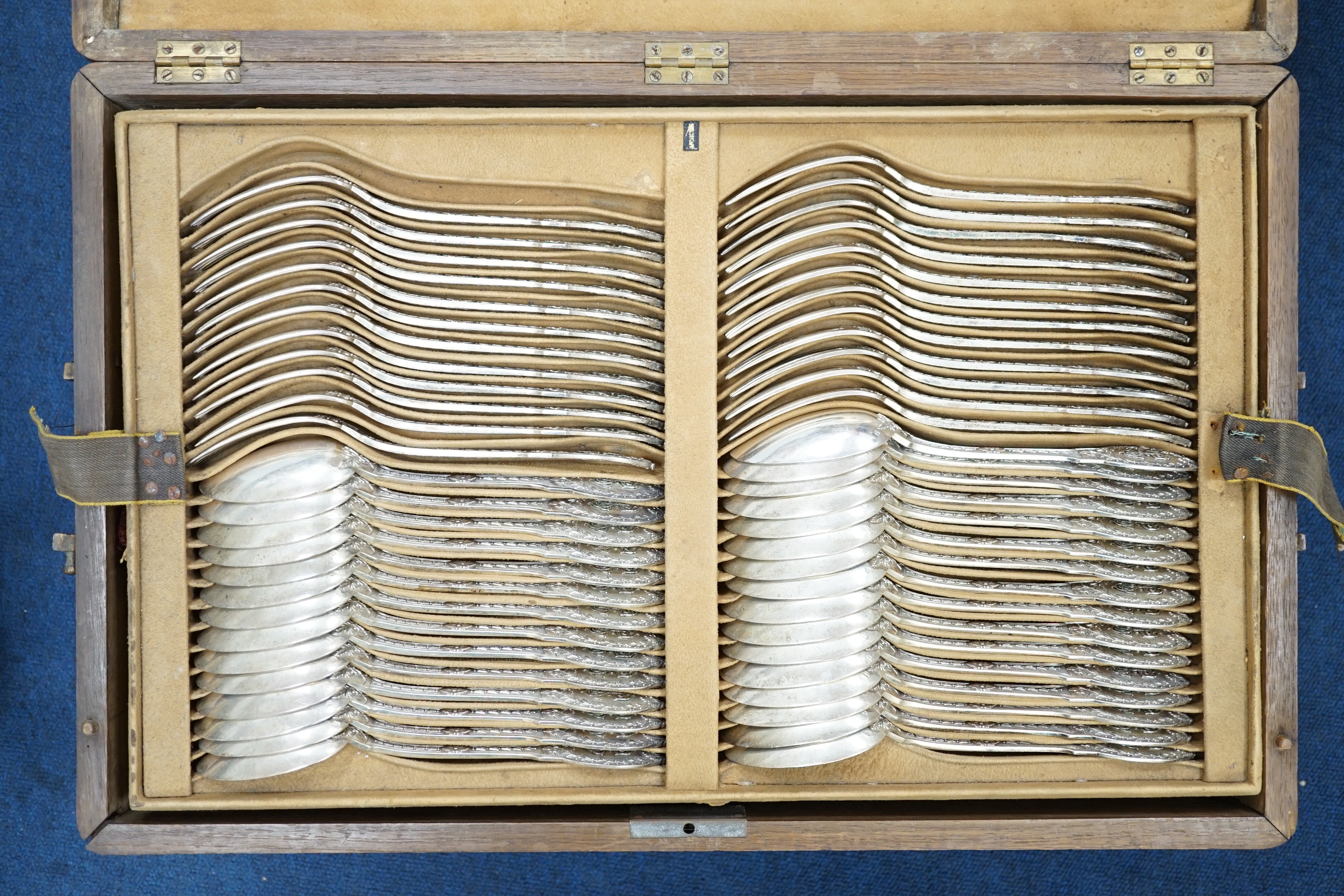 An extensive, almost complete canteen of late 19th/early 20th century French 950 standard silver fancy pattern cutlery, mainly by Gustave Keller of Paris